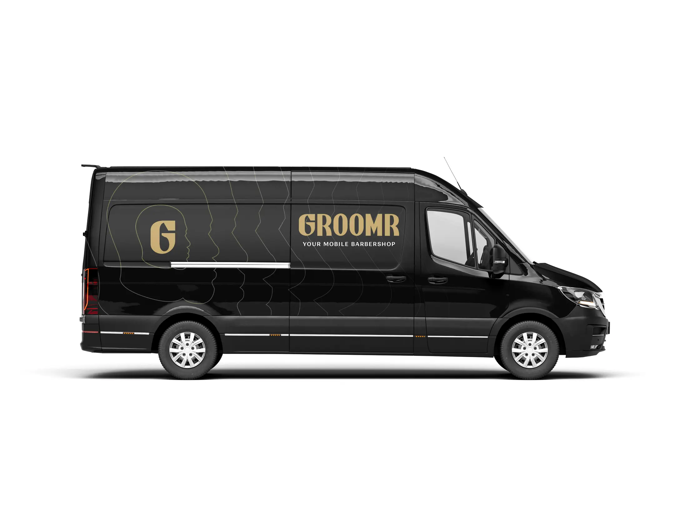 Side view of the black Groomr mobile barbershop van